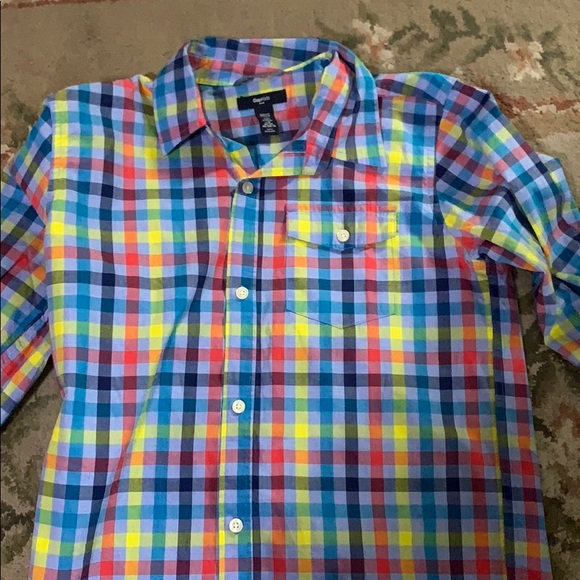 This is two pairs of jeans and a plaid shirt - Picture 2 of 8